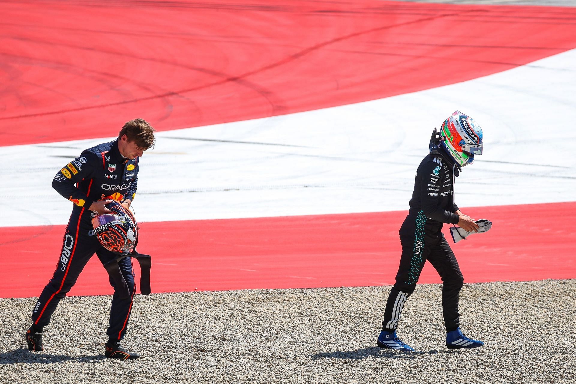 Max Verstappen and Andrea Kimi Antonelli in the run off area following contact during the F1 Grand Prix of Austria - Source: Getty